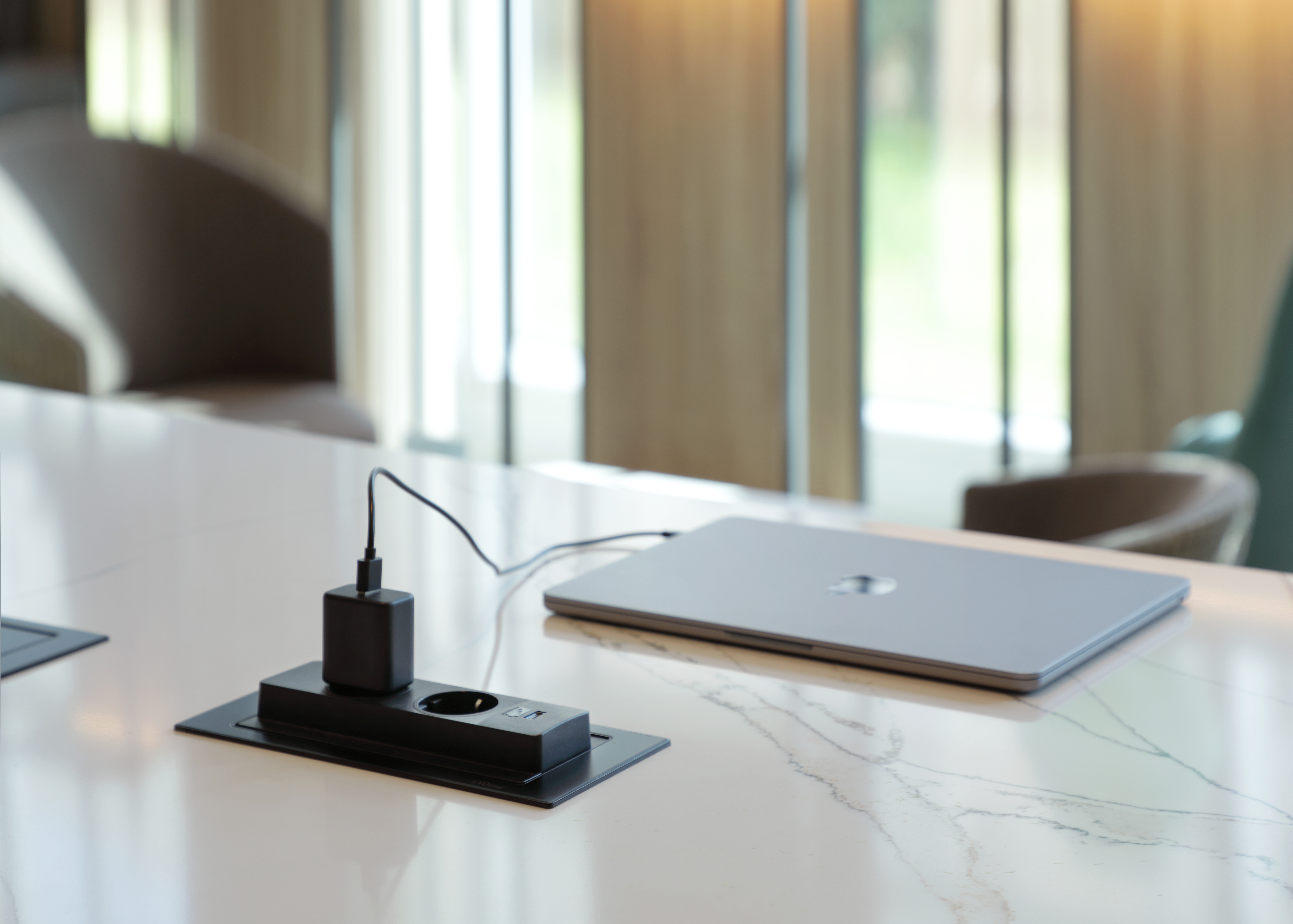 EVOline retractable pop-up socket within a kitchen worktop