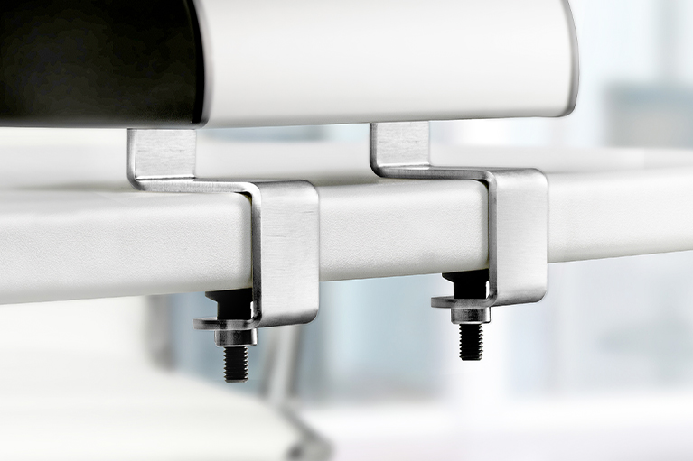 Quicklock Pro mounting for power strip dock, mounted on the table edge