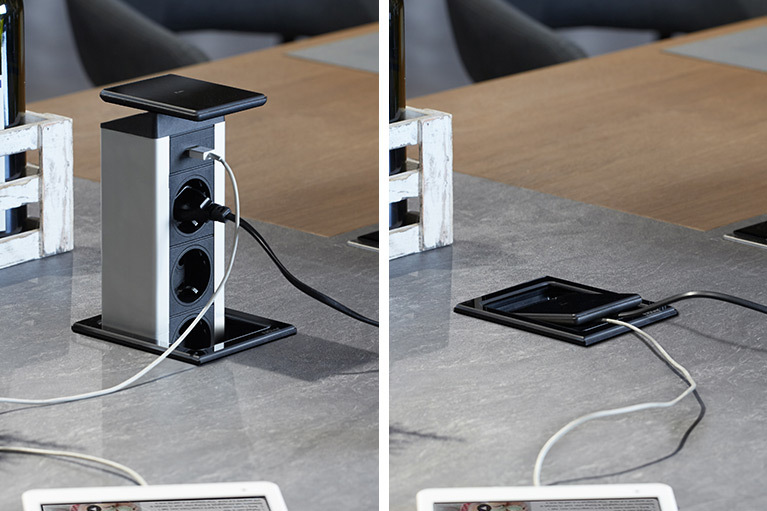 Der patentierte Wippdeckel verhindert, dass die Kabel beim Schließen eingeklemmt werden Port Push in geöffnetem und geschlossenem Zustand